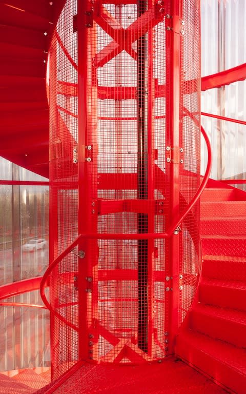 Tantalising: the Mondrian-red spiral staircase