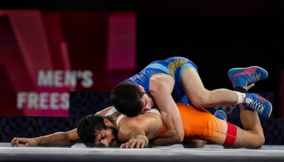 <div class="paragraphs"><p>India's Ravi Dahiya against Zavur Uguev of Russian Olympic Committee during the Tokyo Olympics gold medal match.</p></div>