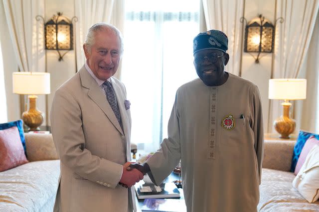 <p>Andrew Matthews - Pool/Getty </p> King Charles and Nigerian President Bola Ahmed Tinubu during a bilateral meeting on Nov. 30 in Dubai, United Arab Emirates.