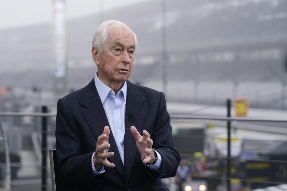 Roger Penske responds to questions during an interview on the victory podium before practice for the Indianapolis 500 auto race at Indianapolis Motor Speedway, Thursday, May 19, 2022, in Indianapolis. Penske took ownership of Indianapolis Motor Speedway just two months before the pandemic closed the country and only now, in his third Indianapolis 500 as promoter, can he throw open the gates and host more than 300,000 guests at “The Greatest Spectacle in Racing.” (AP Photo/Darron Cummings)