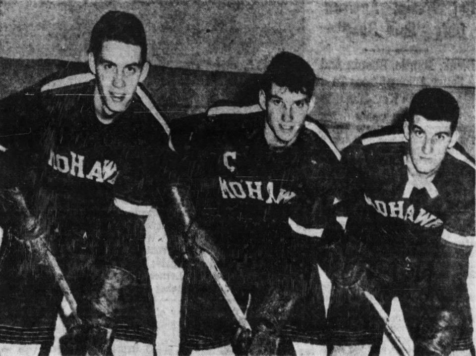 Cincinnati Mohawks players, from left, Reg Grigg, Don Marshall and Russ Kowalchuk, in 1953.