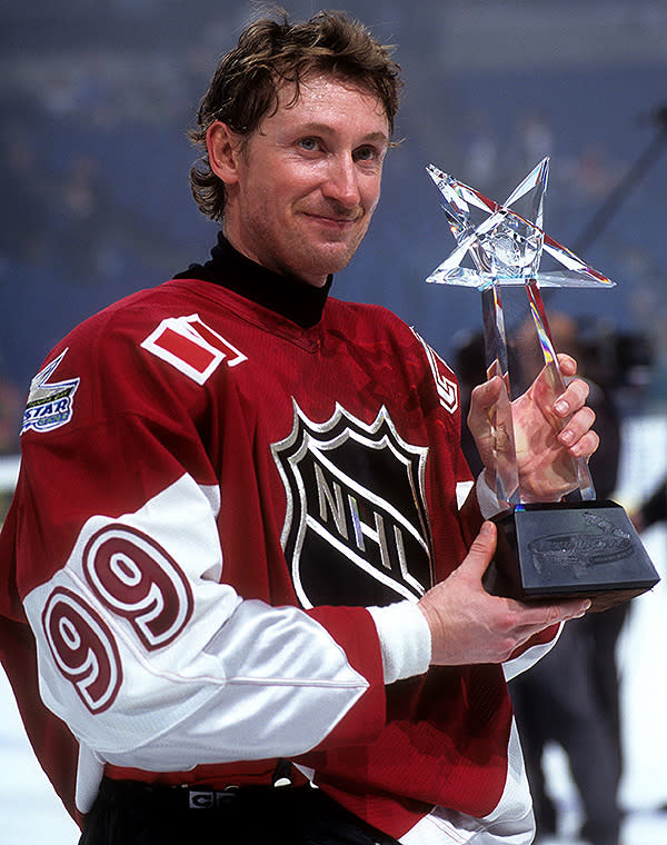 <p>WORST: It's the sleeves. They're bad, and we can't get over it. In this photo, Wayne Gretzky of Team North America and the New York Rangers poses with the 1999 NHL All-Star Game MVP award at the Ice Palace in Tampa Bay. Yes, No. 99 won the MVP Award in '99 because of course he did. (Getty Images) </p>