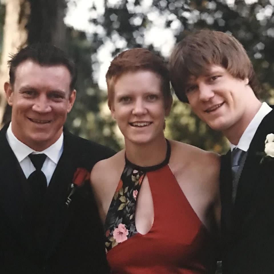 Dean poses with his sister and brother at his first wedding and just check out that hair. Source: Instagram/deanwells