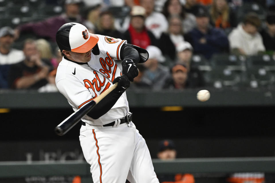 Baltimore Orioles' Adley Rutschman hits an RBI single against the Detroit Tigers during the third inning of a baseball game Saturday, April 22, 2023, in Baltimore. (AP Photo/Terrance Williams)