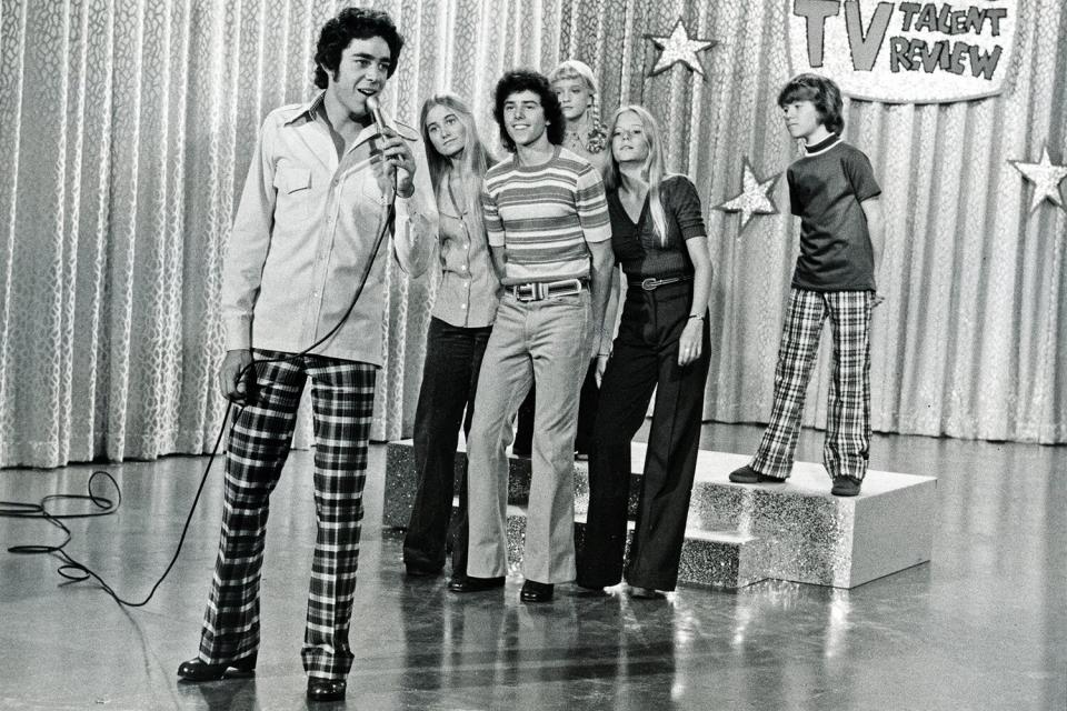 UNITED STATES - SEPTEMBER 14: THE BRADY BUNCH - "Adios, Johnny Bravo" - Season Five - 9/14/73, A talent agent signs Greg to become a rock star named "Johnny Bravo." Greg lets his new fame get to his head, until he discovers that he was only signed because he "fit the suit." Barry Williams (as Greg), Maureen McCormick (as Marcia), Christopher Knight (as Peter), Susan Olsen (as Cindy), Eve Plumb (as Jan), Mike Lookinland (as Bobby) in the Disney General Entertainment Content via Getty Images Television Network series "The Brady Bunch.", (Photo by ABC Photo Archives/Disney General Entertainment Content via Getty Images)