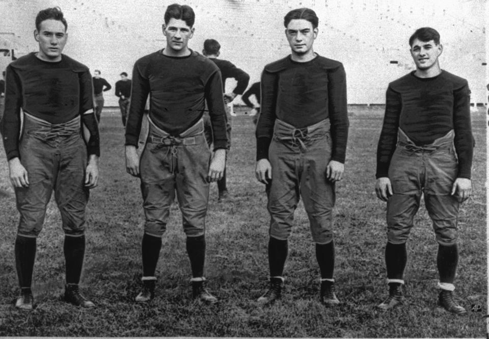 In this 1924, file photo, Notre Dame's famous backfield, "The Four Horsemen," from left, right halfback Don Miller, fullback Elmer Layden, left halfback Jim Crowley and quarterback Harry Stuhldreher, pose on the practice field in South Bend, Ind. Notre Dame, led by the famed Four Horsemen, finished 10-0 in 1925.