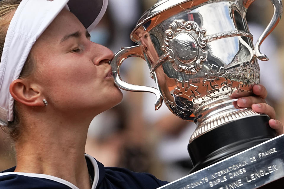 Czech Republic's Barbora Krejcikova kisses the cup after defeating Russia's Anastasia Pavlyuchenkova during their final match of the French Open tennis tournament at the Roland Garros stadium Saturday, June 12, 2021 in Paris. (AP Photo/Michel Euler)