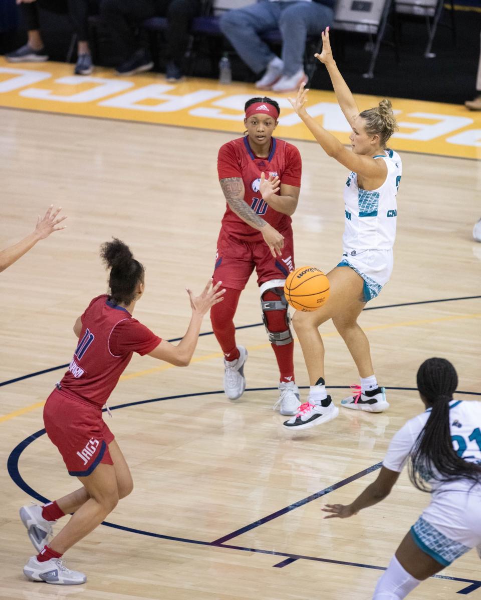 Former Booker T. Washington Wildcat Janelle Jones (10) passes the ball during Coastal Carolina vs. South Alabama game in the first round of the Sun Belt Conference Women’s Basketball Championship at the Pensacola Bay Center on Tuesday, March 5, 2024.