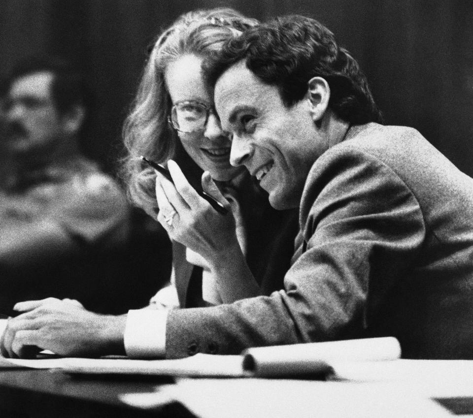 FILE - In this July 6, 1979 file photo, Ted Bundy, right, confers with Margaret Good, a member of his defense team, during jury selection for Bundy's murder trial in Miami, Fla. Bundy is accused of murdering two Florida State University students. (AP Photo/Pool)