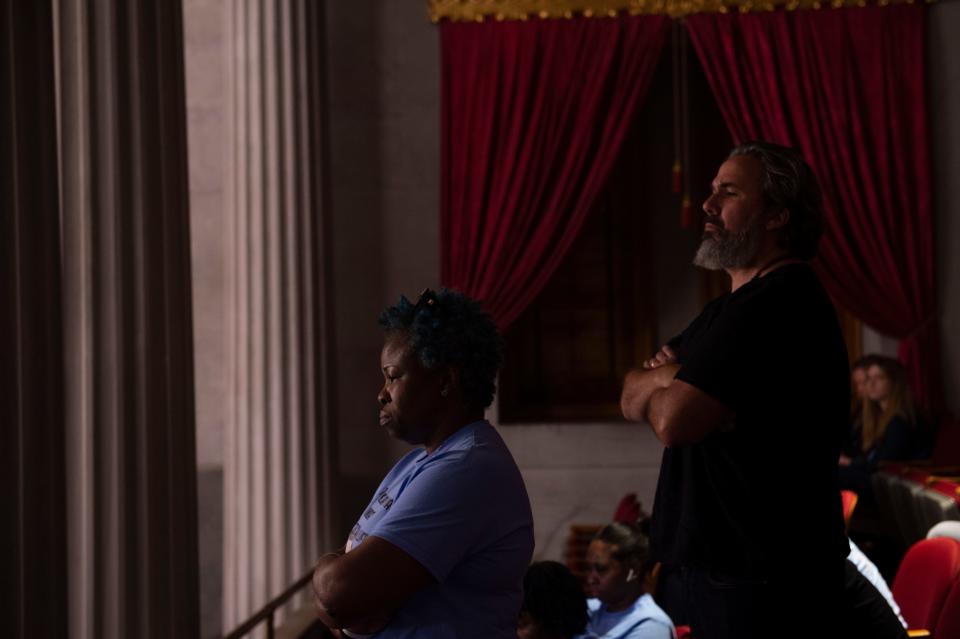 Shaundelle Brooks mother of Akilah DaSilva, who was one of the four people killed in the 2018 Waffle House shooting stands near Manuel Oliver who’s 17-year-old son Joaquin was among the 14 students killed in a mass shooting at Marjory Stoneman Douglas High School in Parkland, Florida, while the two listen from the gallery of the House Chambers in Nashville , Tenn., Monday, March 6, 2023.  "Until you are in the situation they will never understand," Brooks said following Monday night's session.