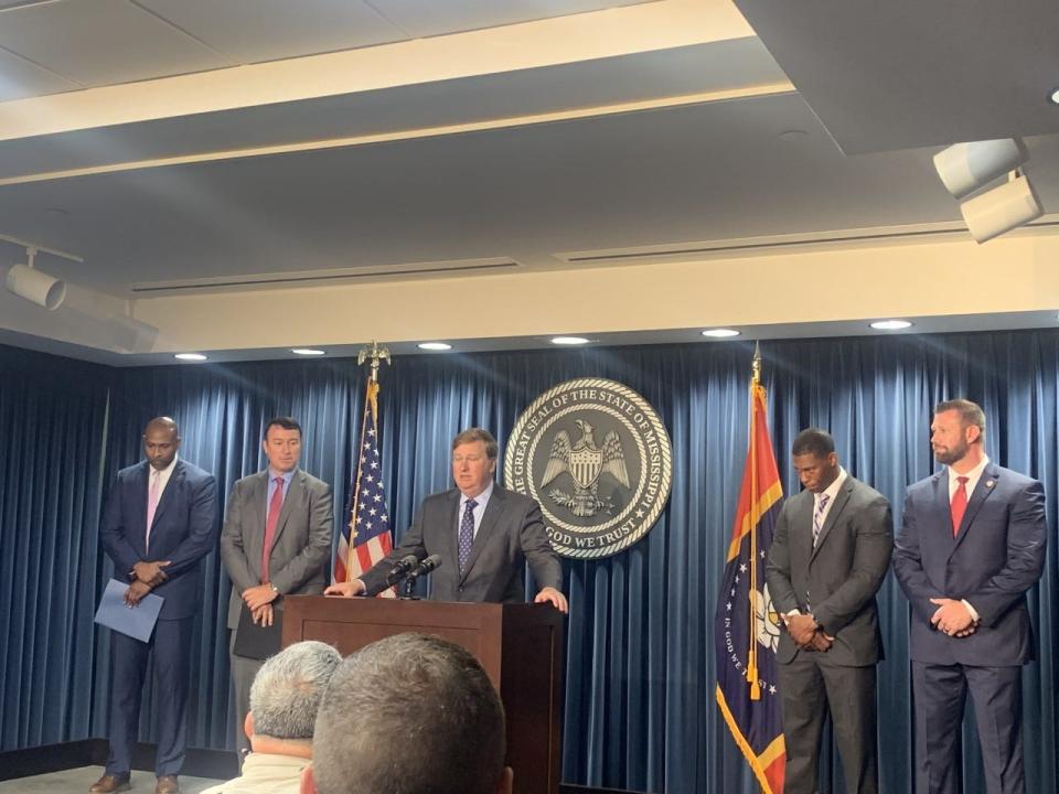 Gov. Reeves introduces three new public safety officials to the city of Jackson. Standing to the far left side is Lt. Colonel Charles Haynes, standing left of Reeves is Assistant Chief Joshua Shipp, standing to the far right is Capital Police Chief Bo Luckey.