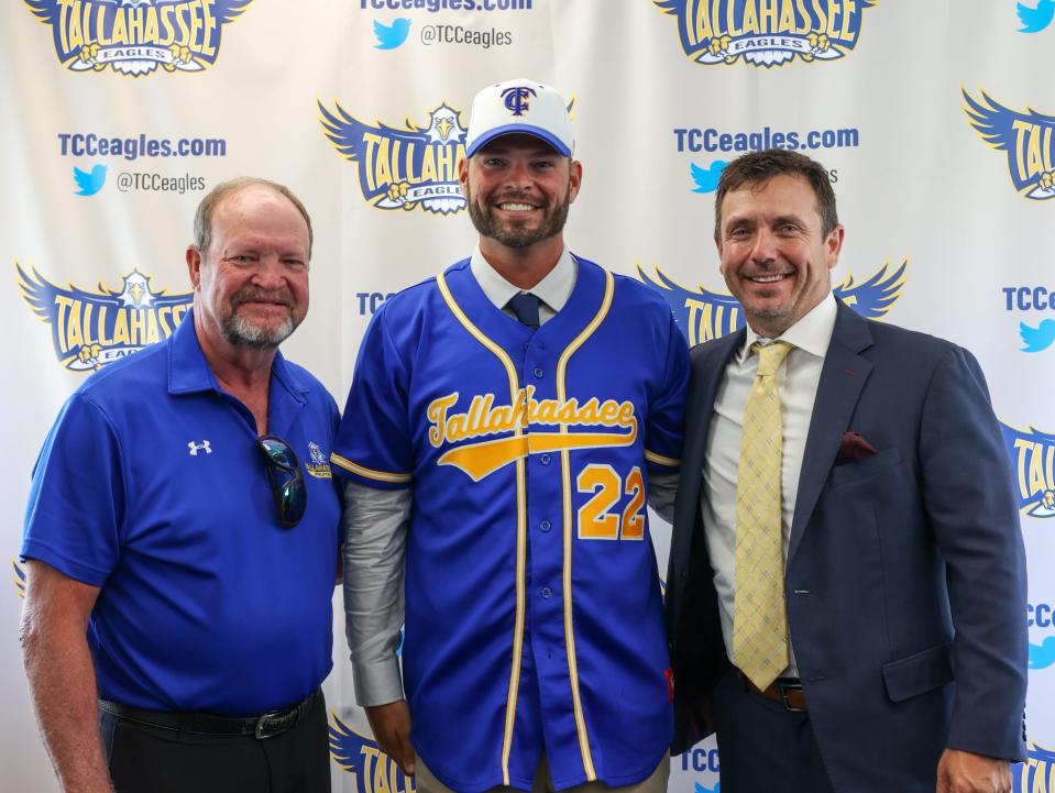 Former Tallahassee Community College baseball head coach Mike McLeod (left), current head coach Bryan Henry (middle), and director of athletics Chuck Moore (right) pose for a photo at Henry's introductory press conference in Tallahassee, Florida, Wednesday, July 6, 2022