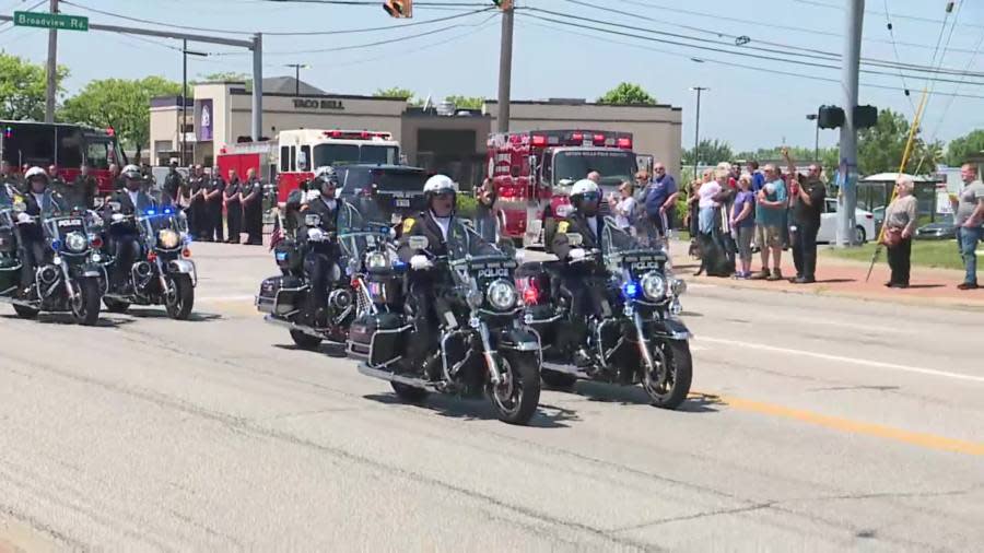 Officers lead Jacob Derbin funeral procession.