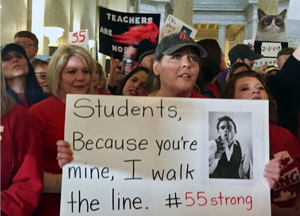 Jennifer Hanner, a first-year teacher from Harts, W.Va., protests outside the state Senate chambers at the Capitol in Charleston.