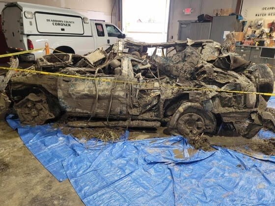 This Oct. 2021 photo released by Indiana State Police shows a SUV recovered from the Ohio River near Aurora, Ind. DNA testing has confirmed that a bone found in an SUV pulled last fall from the Ohio River in Indiana is from an Ohio woman who vanished with her two young children in 2002. Indiana State Police announced Tuesday, Jan. 11, 2022 that Dearborn County's coroner learned Friday the bone was confirmed as belonging to Stephanie Van Nguyen. (Indiana State Police via AP)