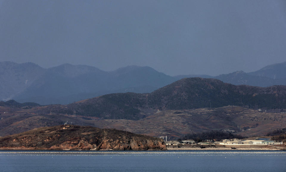 North Korea's Hwanghae province is seen from Yeonpyeong Island, South Korea, Saturday, Jan. 6, 2024. The influential sister of North Korean leader Kim Jong Un mocked South Korea’s ability to detect weapons launches by the North on Sunday, as she denied Seoul’s claim that North Korea fired artillery shells into the sea the previous day. South Korea's military quickly dismissed her statement as “a low-level psychological warfare" and warned that it will make a stern response to any provocations by North Korea. (Park Dong-joo/Yonhap via AP)