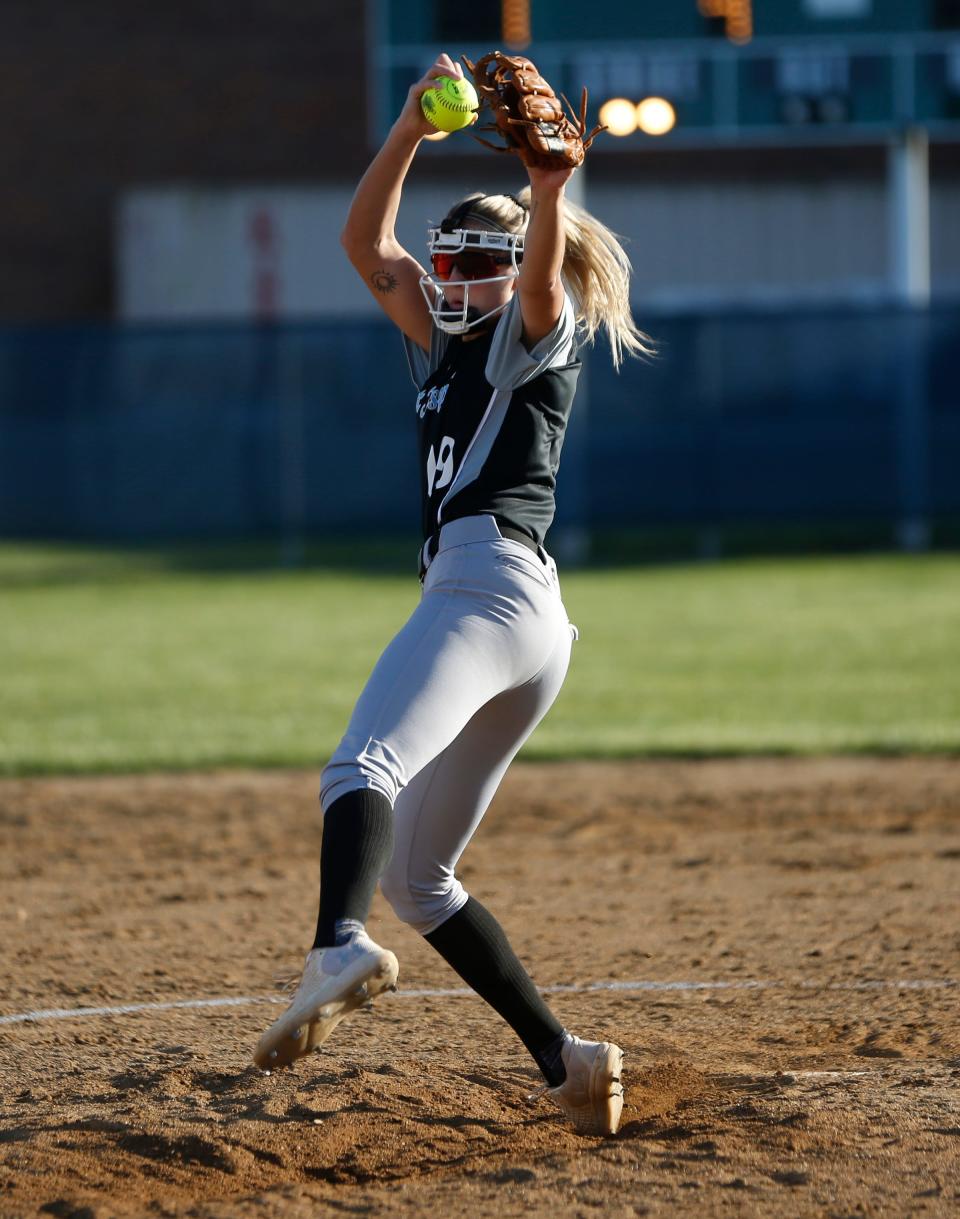 Saint Joseph junior Berkley Zache throws a pitch in the fourth inning of a softball game against New Prairie Monday, April 8, 2024, at New Prairie High School in New Carlisle.
