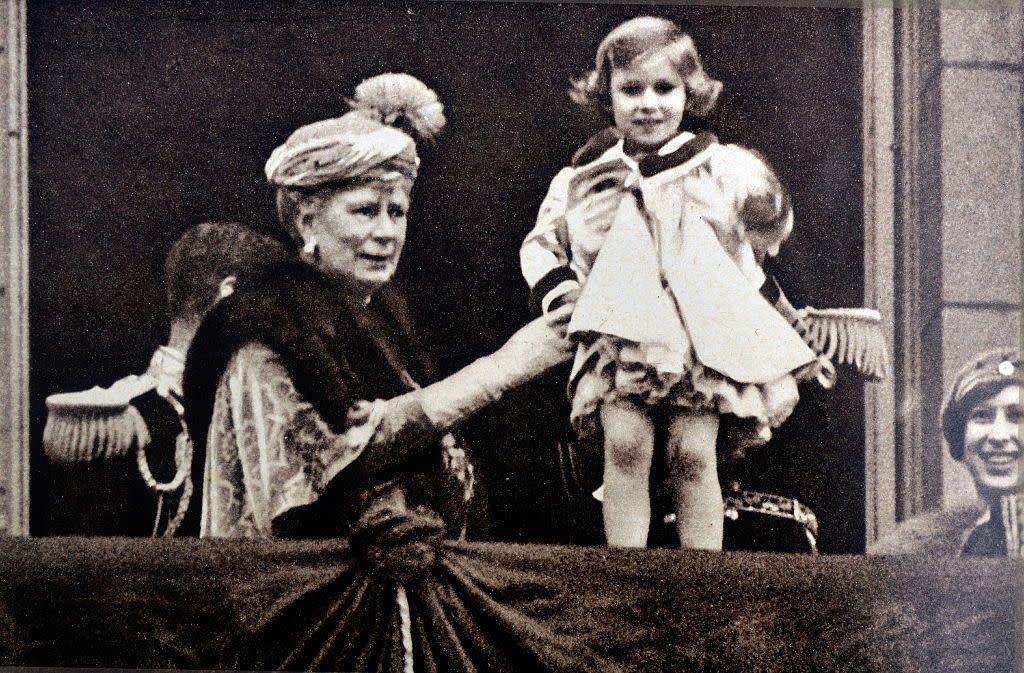 princess margaret is held by her grandmother queen mary