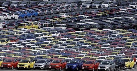 Newly manufactured cars of the automobile maker Honda await export at port in Yokohama, south of Tokyo June 23, 2015. REUTERS/Toru Hanai