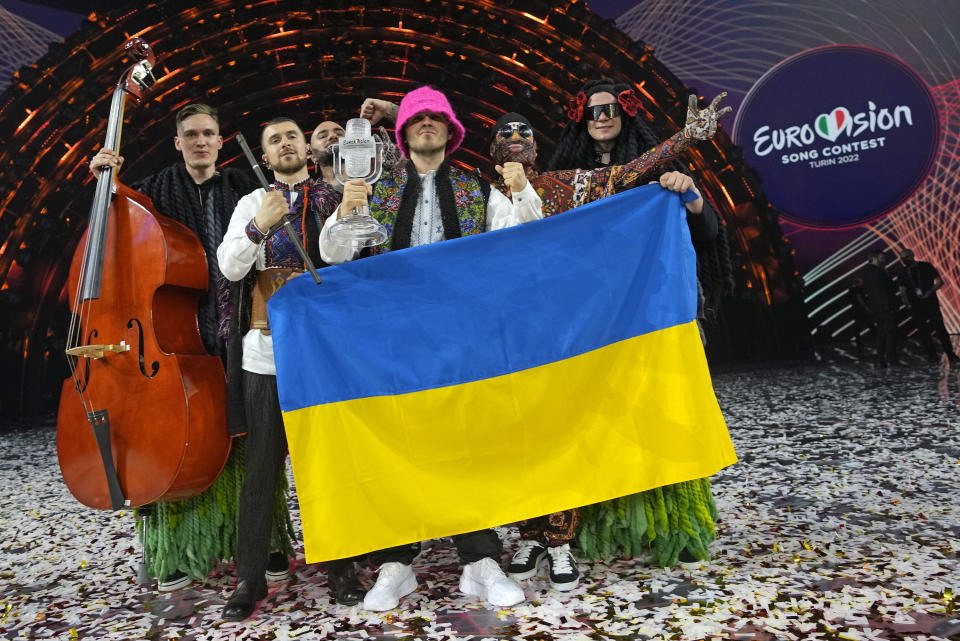 Kalush Orchestra from Ukraine celebrate after winning the Grand Final of the Eurovision Song Contest at Palaolimpico arena, in Turin, Italy, Saturday, May 14, 2022. (AP Photo/Luca Bruno)