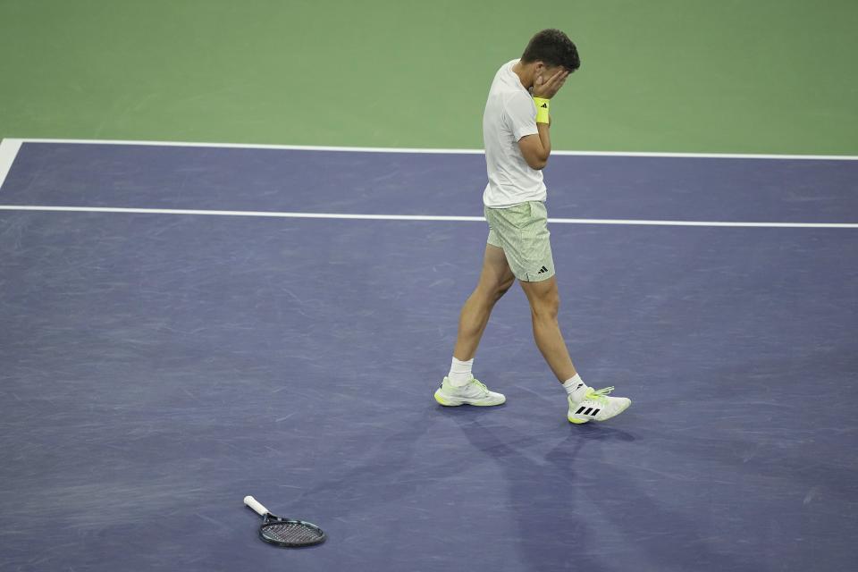 Luca Nardi, of Italy, celebrates after upsetting Novak Djokovic, of Serbia, at the BNP Paribas Open tennis tournament Monday, March 11, 2024, in Indian Wells, Calif. Nardi won 6-4, 3-6, 6-3. (AP Photo/Mark J. Terrill)