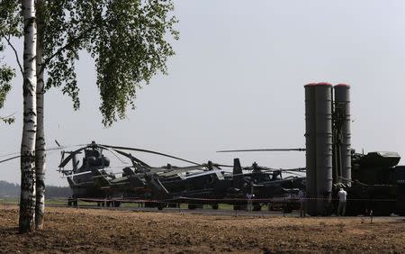 Russian military aircraft are on display during the event titled the "Innovations Day" organized by Russia's Western military command at Levashovo airbase outside St. Petersburg, June 6, 2014. REUTERS/Alexander Demianchuk