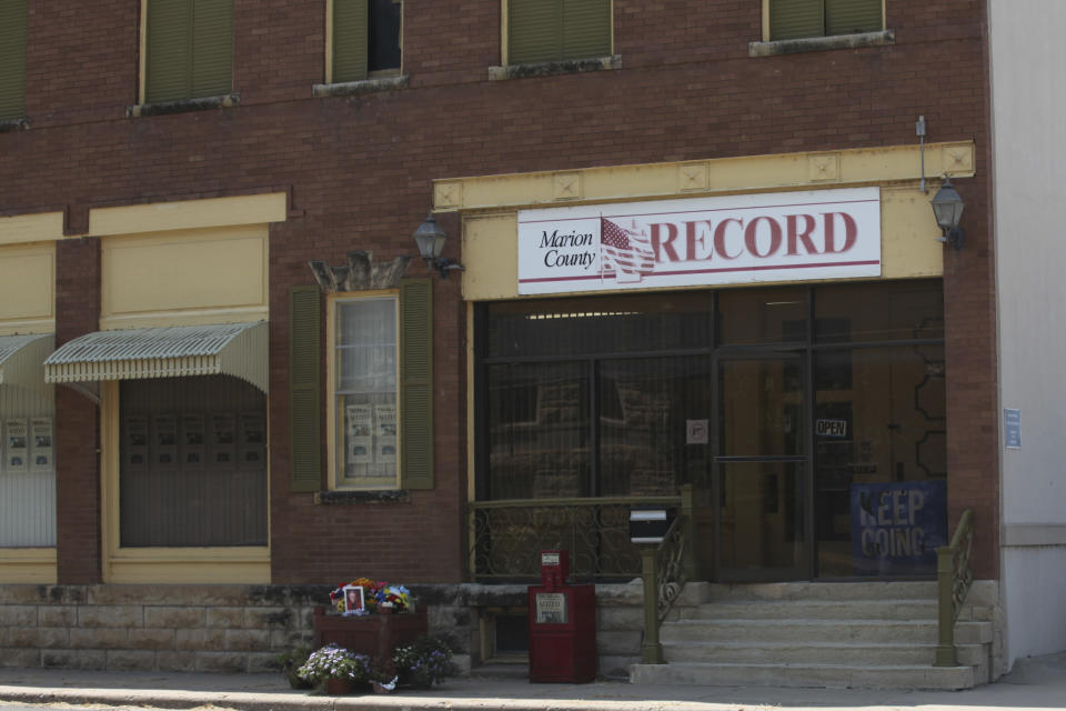The offices of the Marion County Record weekly newspaper sit across the street from the Marion County, Kansas, courthouse, Monday, Aug. 21, 2023, in Marion, Kansas. The newspaper's aggressive coverage divided its central Kansas community of about 1,900 residents even before a raid by local police on its offices on Aug. 11, brought it and the town to international attention. (AP Photo/John Hanna)