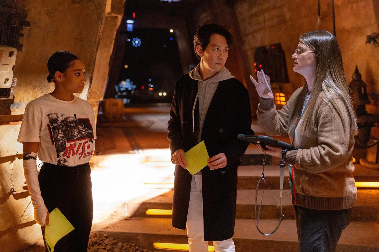 (L-R): Amandla Stenberg, Lee Jung-jae and Director Leslye Headland on the set of Lucasfilm's THE ACOLYTE, exclusively on Disney+