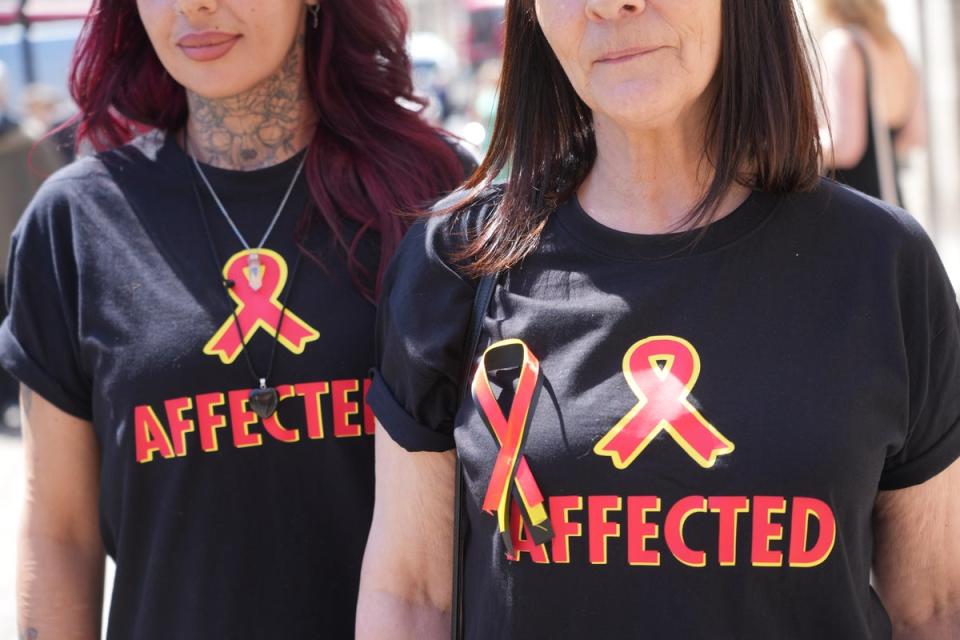 Victims and campaigners outside Central Hall in Westminster, London, after the publication of the Inquiry report (Jeff Moore/PA Wire)