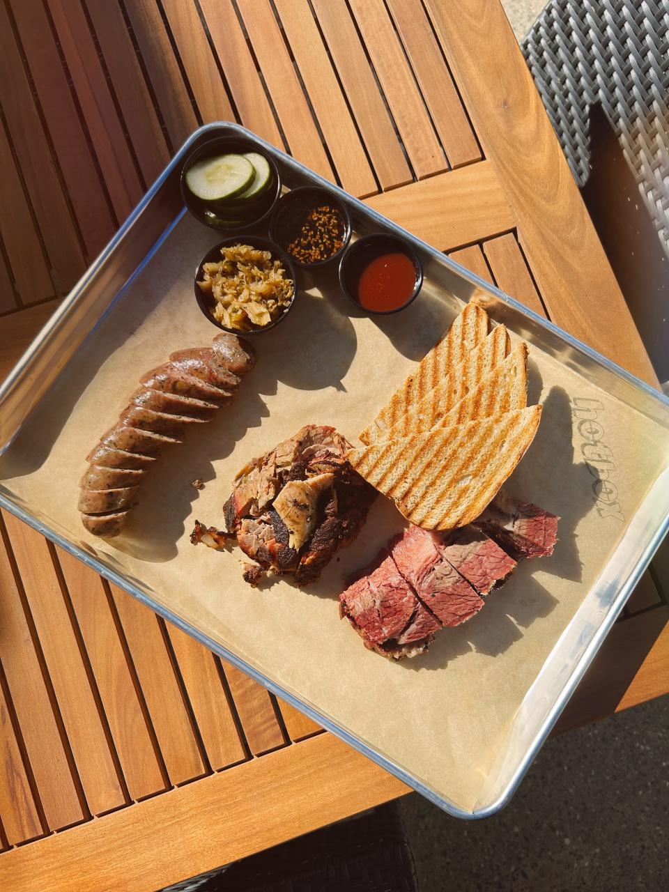 Hotbox is a seasonal outdoor eatery at Ukiah Japanese Smokehouse that specializes in smoked meat sandwiches, barbecue and tiki-style cocktails.