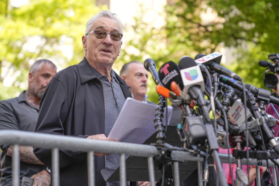 Robert De Niro speaks to reporters in support of President Joe Biden across the street from former President Donald Trump's criminal trial in New York, Tuesday, May 28, 2024. (AP Photo/Seth Wenig)