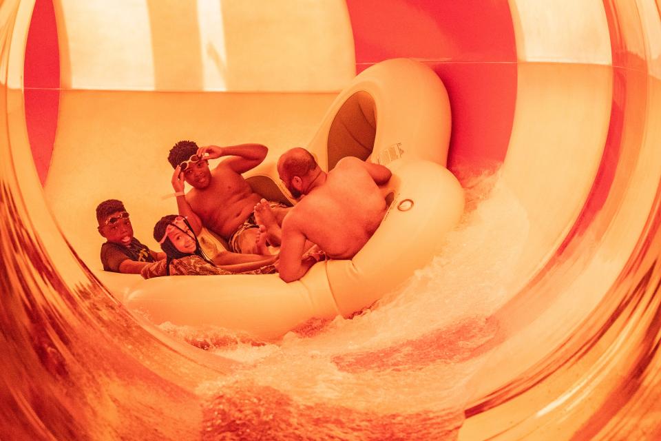 A family enjoys the Great Geyser Water Park at the grand opening of the Great Wolf Lodge in Perryville, Maryland, Thursday, June 29, 2023.