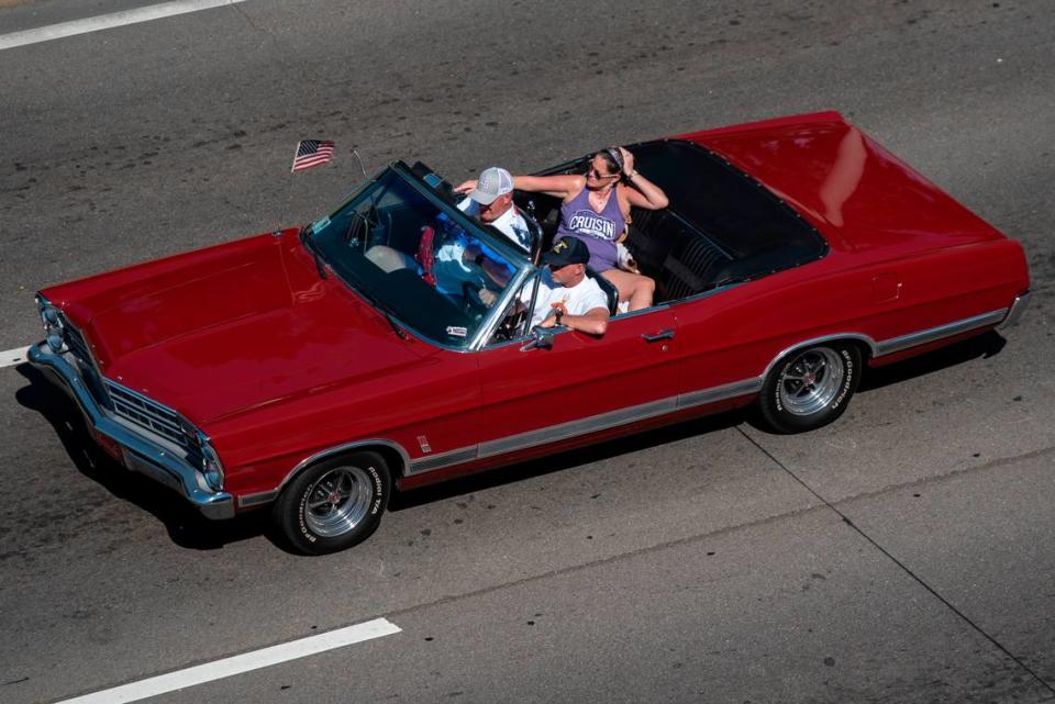 Cruisers drive down Highway 90 in Downtown Biloxi during Cruisin’ the Coast 2022. The event, the largest in Mississippi, won a state and national award in April.