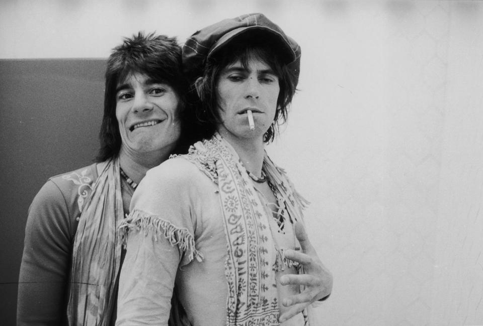 <p>Ronnie Wood embraces Keith Richards backstage during the Rolling Stones' 1975 Tour of the Americas.</p>
