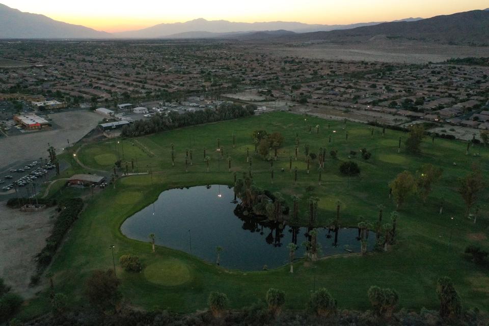 The sun sets over The Lights at Indio Golf Course in Indio, Calif., August 4, 2023. 