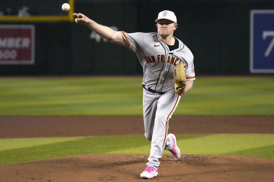 San Francisco Giants pitcher Logan Webb throws against the Arizona Diamondbacks in the first inning during a baseball game, Sunday, May 14, 2023, in Phoenix. (AP Photo/Rick Scuteri)