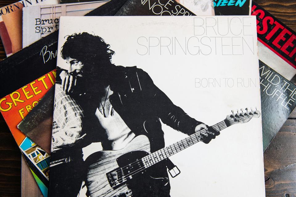 Bruce Springsteen's 'Born to Run' atop a collection of his other albums.