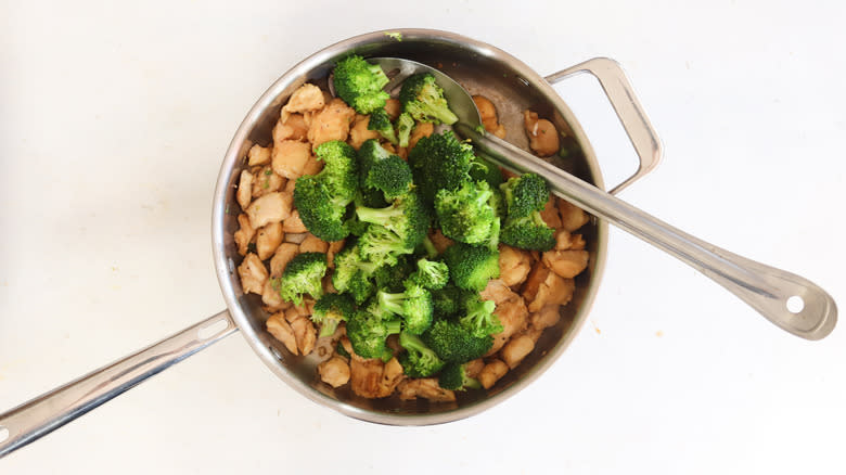 broccoli and chicken in a pan