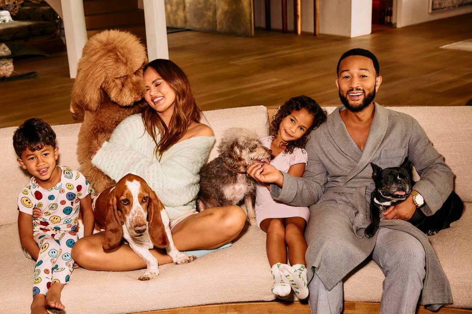 <p>Kismet</p> Chrissy Teigen and John Legend with son Miles, daughter Luna and their four dogs, Petey, Pearl, Pebbles and Penny.