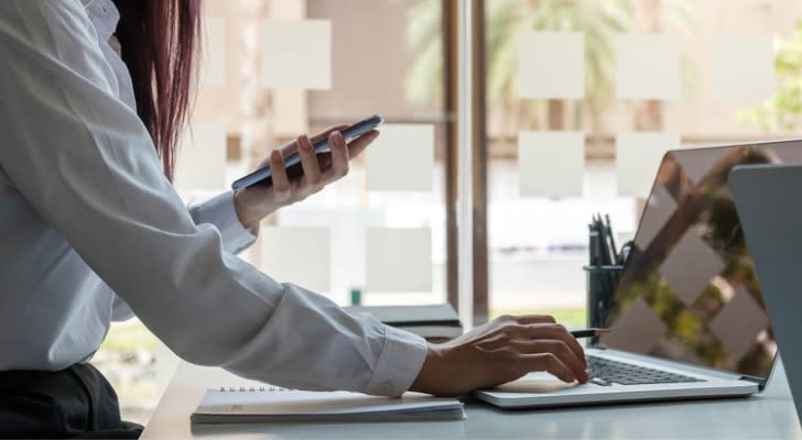 A job candidate looking up what to include in her financial advisor cover letter.