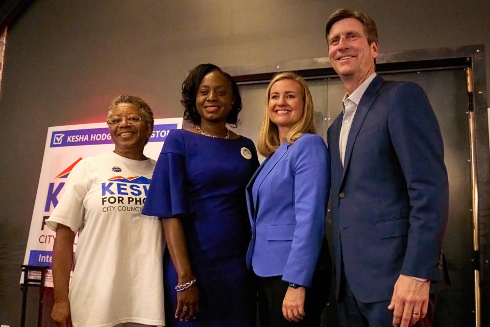 Lajuane Pleasant, Kesha Hodge Washington, Phoenix Mayor Kate Gallego and Rep. Greg Stanton pose for a photo during Hodge Washington’s election watch party at Warehouse 215 in Phoenix on March 14, 2023.