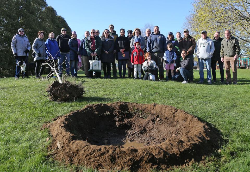 The City of Portsmouth celebrated Arbor Day, April 29, 2022 with Assistant Mayor Joanna Kelley, center, reading a proclamation at Four Tree Island where a sugar maple tree was planted.