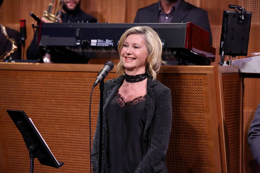 THE TONIGHT SHOW STARRING JIMMY FALLON -- Episode 0547 -- Pictured: Singer Olivia Newton-John with The Roots on October 4, 2016 -- (Photo by: Andrew Lipovsky/NBCU Photo Bank/NBCUniversal via Getty Images via Getty Images)