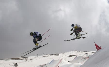 Freestyle Skiing - FIS Snowboarding and Freestyle Skiing World Championships - Men's Ski Cross finals - Sierra Nevada, Spain - 18/03/17 - Victor Oehling Norberg of Sweden and Jamie Prebble of New Zealand in action during the big final. REUTERS/Albert Gea