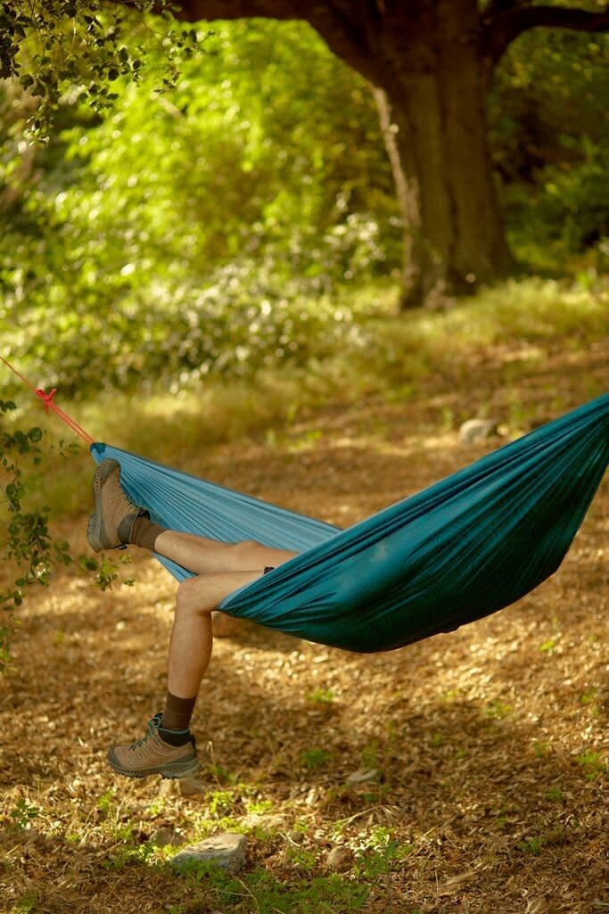 You can easily throw this hammock in a backyard for a weekend away. <a href="https://fave.co/2CoVSqt" target="_blank" rel="noopener noreferrer">Find it for $35 at Urban Outfitters</a>. 