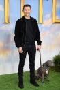 <p>All-black everything is always a winning look, particularly when it's elevated by a statement suede jacket and offset with a cute (if not slightly nervous-looking) dog in a complementary shade.</p>