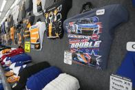 Kyle Larson merchandise is displayed by a vendor during a practice session for the Indianapolis 500 auto race at Indianapolis Motor Speedway, Monday, May 20, 2024, in Indianapolis. (AP Photo/Darron Cummings)