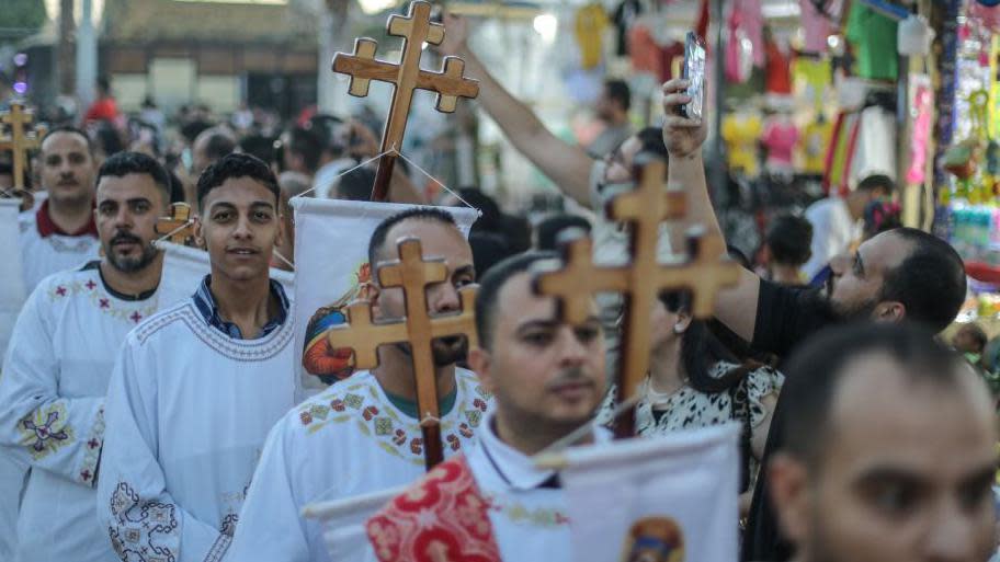 Orthodox Christians take part in mass to celebrate the 'Festival of the Virgin Mary', which is accepted as the 'ascension day of Virgin Mary' in the Christian belief, at Coptic Orthodox Church in Asyut, Egypt on 18 June.