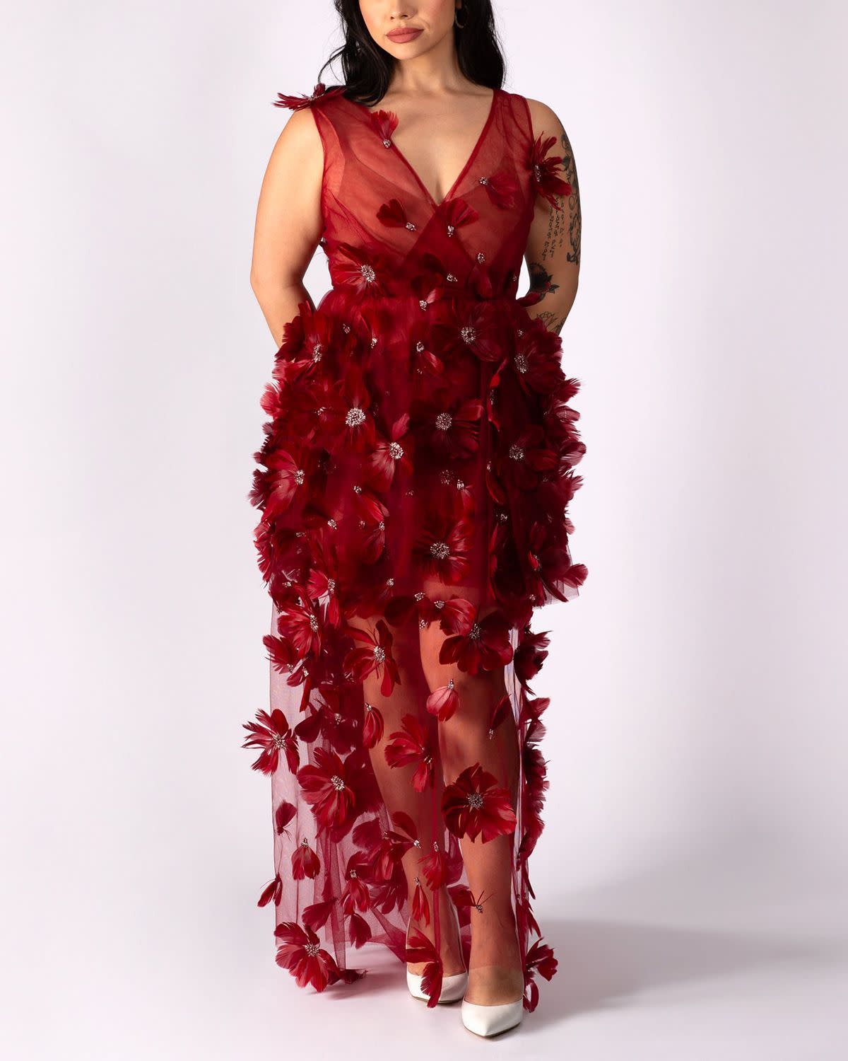 <p><a href="https://lesleyhampton.com/products/burgundy-3d-feather-mini-dress-pre-sale-copy?pr_prod_strat=e5_desc&pr_rec_id=e51faffdd&pr_rec_pid=7308185763922&pr_ref_pid=7306063839314&pr_seq=uniform" rel="nofollow noopener" target="_blank" data-ylk="slk:Shop Now;elm:context_link;itc:0;sec:content-canvas" class="link rapid-noclick-resp">Shop Now</a></p><p>Feather Floral Maxi</p><p>lesleyhampton.com</p><p>$1115.00</p>