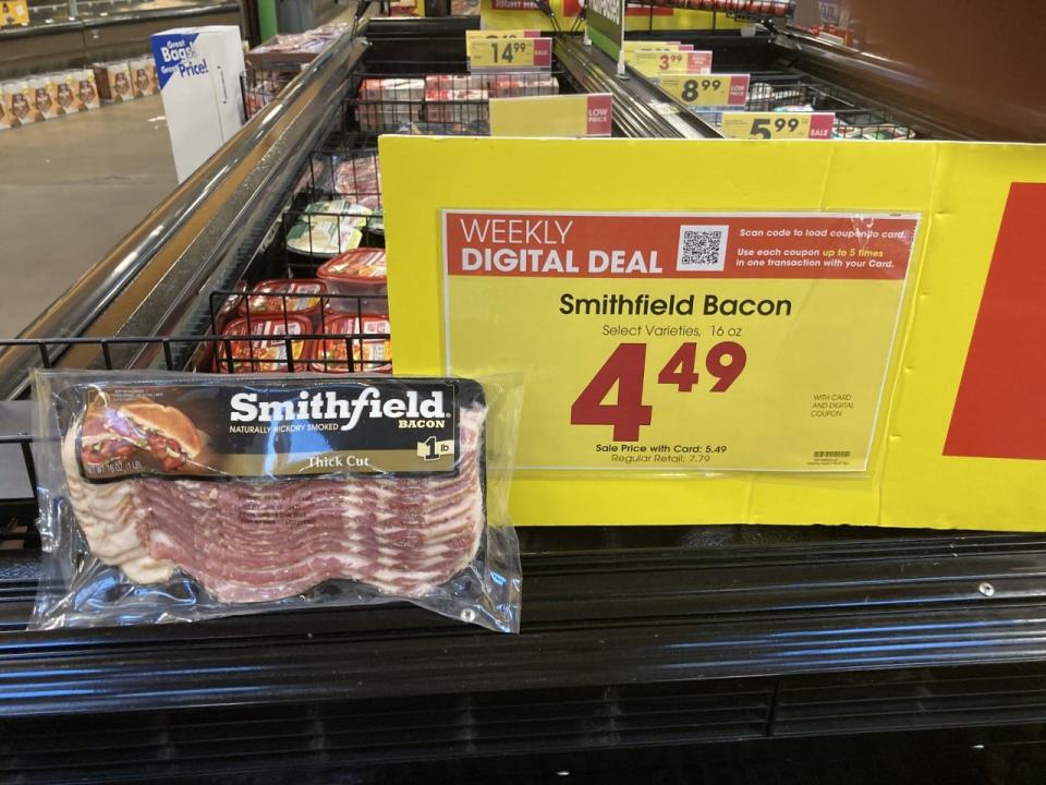 A pound of Smithfield bacon is on sale for $4.49 today at Kroger. So two packages of bacon costs less than the $10.99 in the signs.